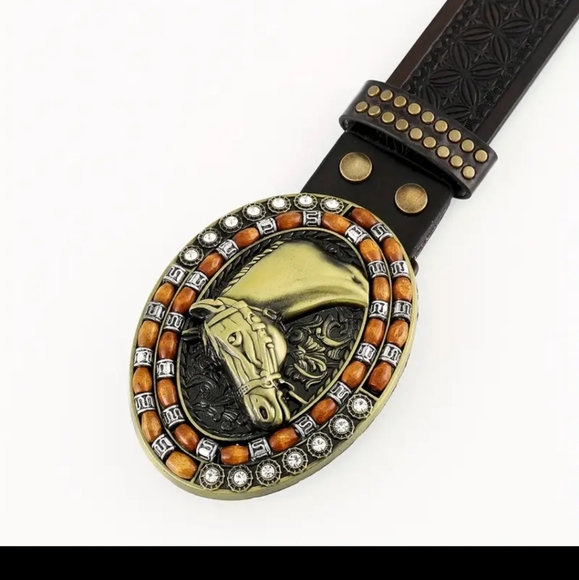 New western horse belt buckle and brown belt.